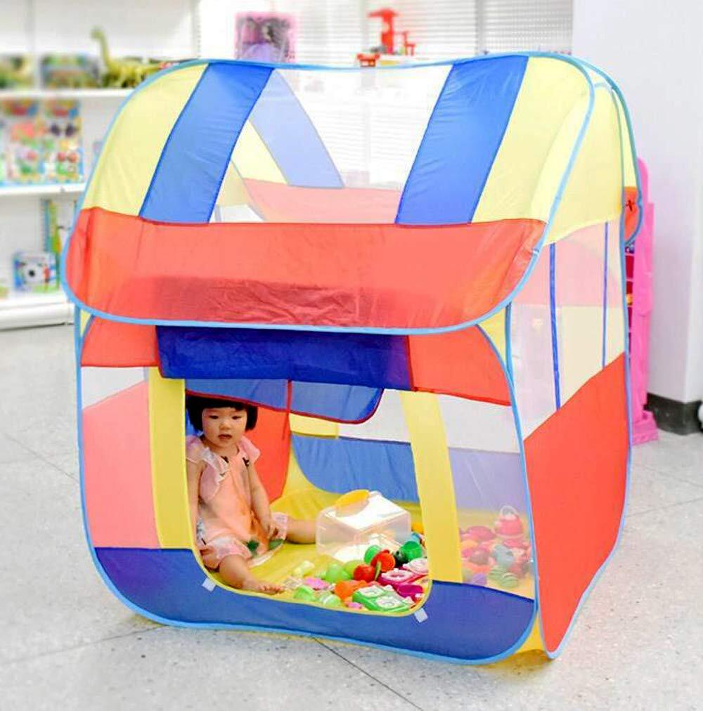 Kids play tent house lifestyle – toddler girl playing inside colorful playhouse Pakistan